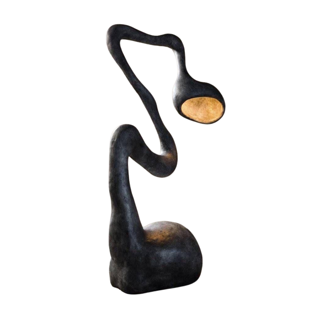 Biomorphic black floor lamp featuring a curved snake-like body and warm internal glow.
