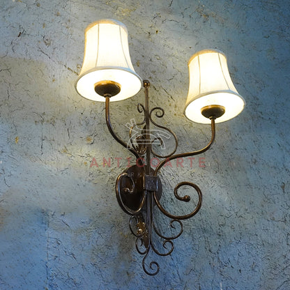AnticoArte Victorian Twin Arm Wall Sconce | Bronze Wrought Iron Double Linen Shade Wall Lamp | Ornate Scroll Antique Wall Light for Home & Hotel Decor