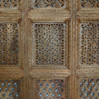 A hand-carved square wooden wall panel featuring a nine-grid design with intricate floral and geometric openwork lattices.