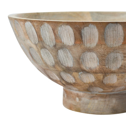 A round, natural mango wood bowl with a footed base and a carved, circular pattern decorating the outer surface.