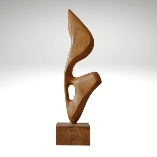 An abstract biomorphic wood sculpture with smooth curves and a hollow cutout, mounted on a square wooden base.