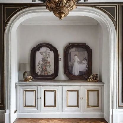 A vintage arched dark wood picture frame
