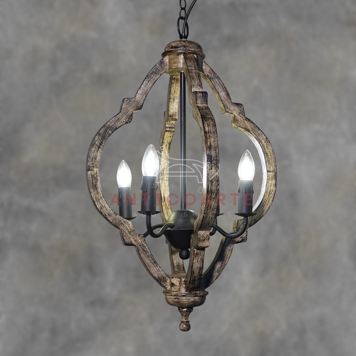 Rustic wooden orb chandelier with an antiqued gold finish and four candelabra lights.