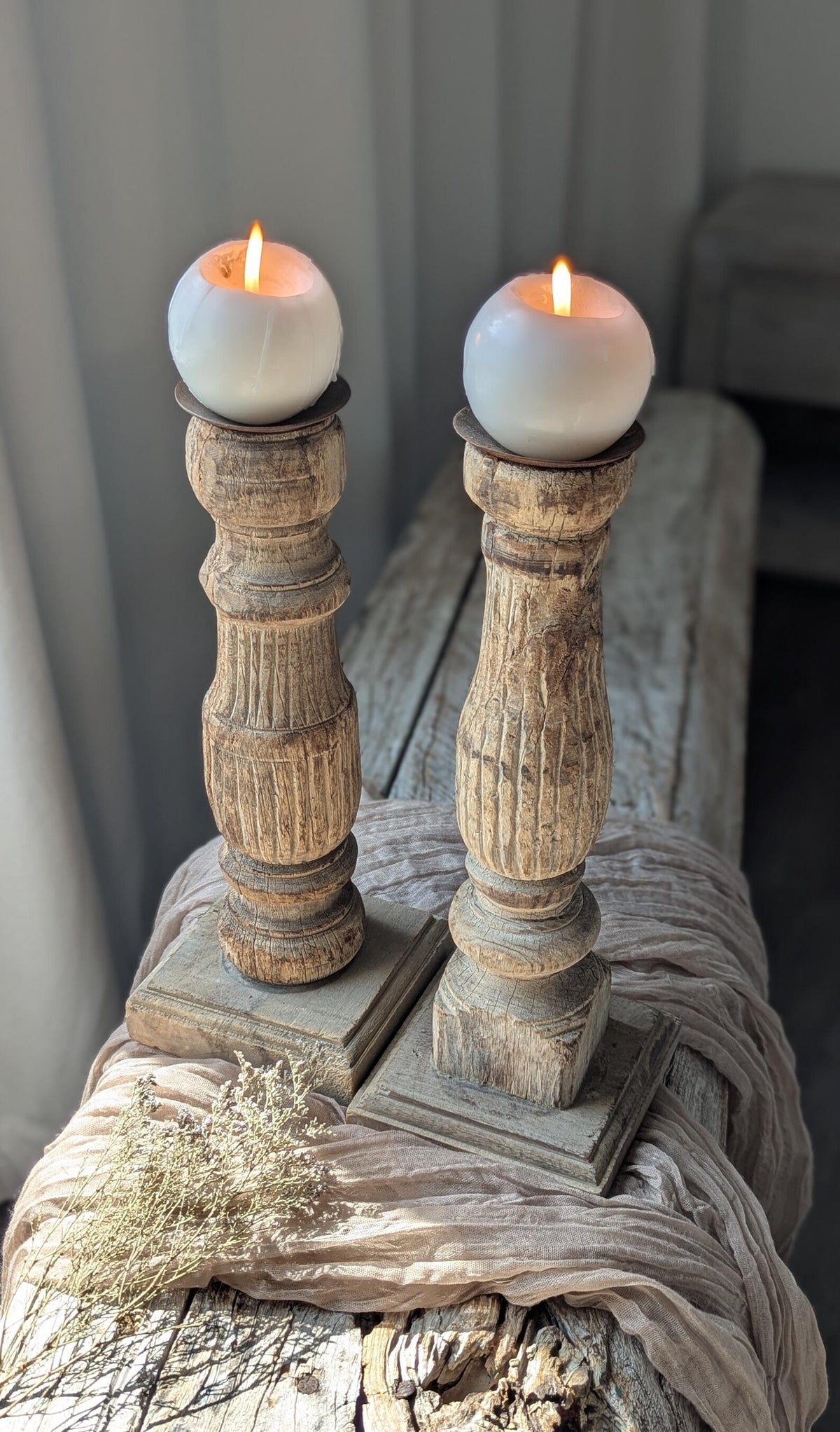 Two vintage-style turned wood candle holders 