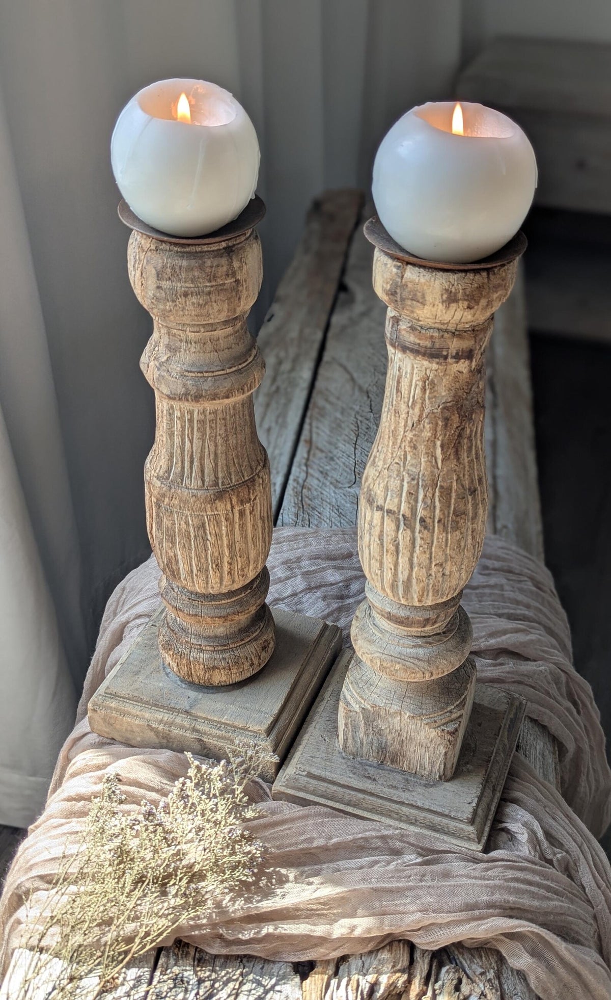 Two vintage-style turned wood candle holders 