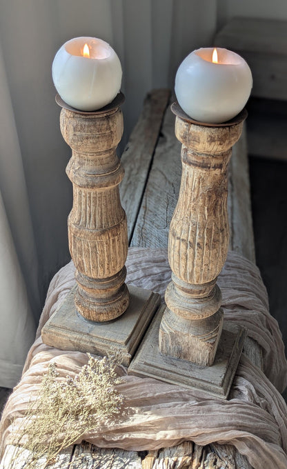 Two vintage-style turned wood candle holders 