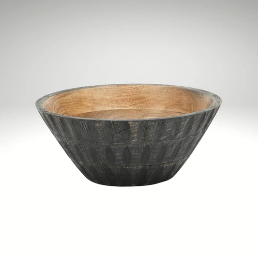 A round wooden bowl with a natural light brown wood interior and a textured, dark charcoal-grey ribbed exterior.