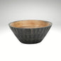 A round wooden bowl with a natural light brown wood interior and a textured, dark charcoal-grey ribbed exterior.