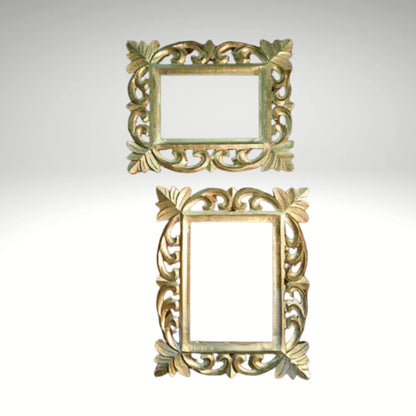 Two ornate gold-carved wooden picture frames