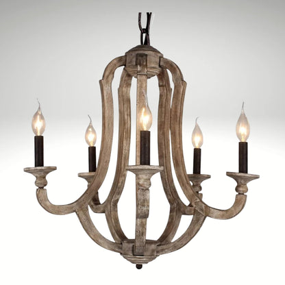 A 5-light rustic farmhouse chandelier made of distressed weathered wood with vintage candle-style bulbs.