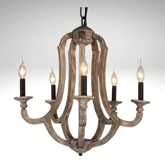 A 5-light rustic farmhouse chandelier made of distressed weathered wood with vintage candle-style bulbs.