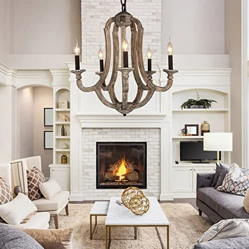 A 5-light rustic farmhouse chandelier made of distressed weathered wood with vintage candle-style bulbs.