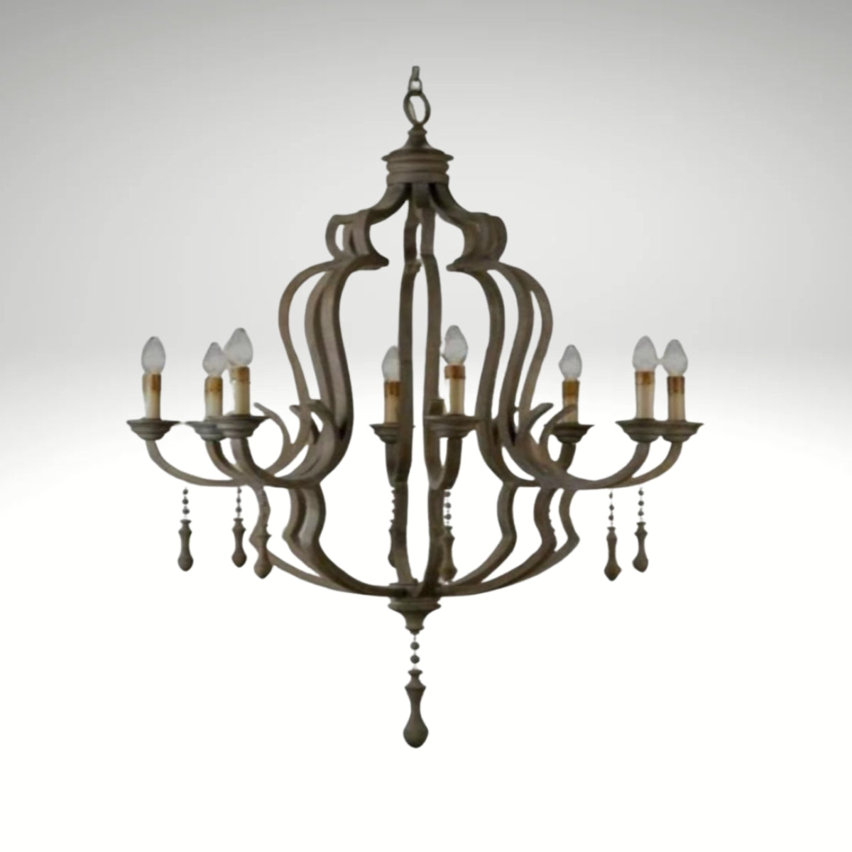 Rustic brown eight-light chandelier with an ornate scrolled frame and hanging wooden droplet accents.