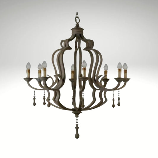 Rustic brown eight-light chandelier with an ornate scrolled frame and hanging wooden droplet accents.