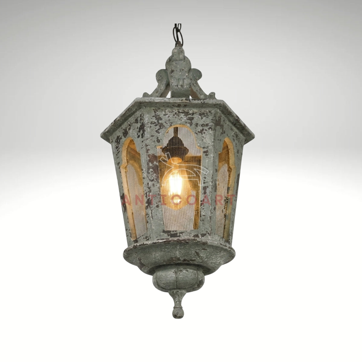 Vintage rustic hanging light featuring an aged finish and traditional design
