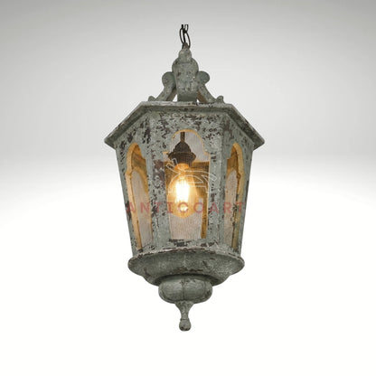 Vintage rustic hanging light featuring an aged finish and traditional design