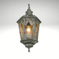 Vintage rustic hanging light featuring an aged finish and traditional design