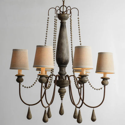 Rustic 6-light distressed wood chandelier with beige fabric shades and decorative beads.
