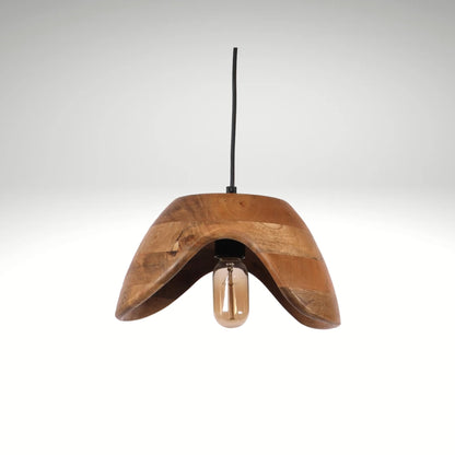 A modern hanging pendant light featuring a curved, wave-shaped natural mango wood shade with an exposed vintage Edison bulb.