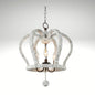 A 3-light crown-shaped chandelier with a distressed white wood finish hanging from a metal chain.