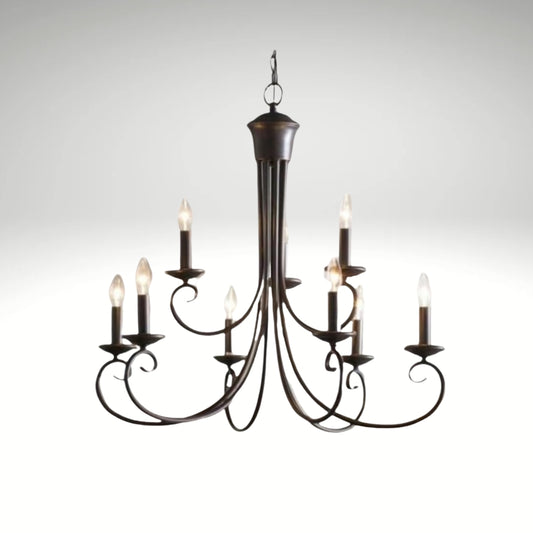 A classic 9-light metal chandelier with curved scrolling arms and candle-style bulbs