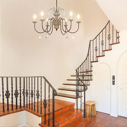 Rustic 6-light distressed wood chandelier with hanging crystal drops.