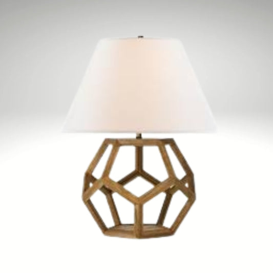 Side table lamp featuring a hollow hexagonal wood frame base and a white empire shade.