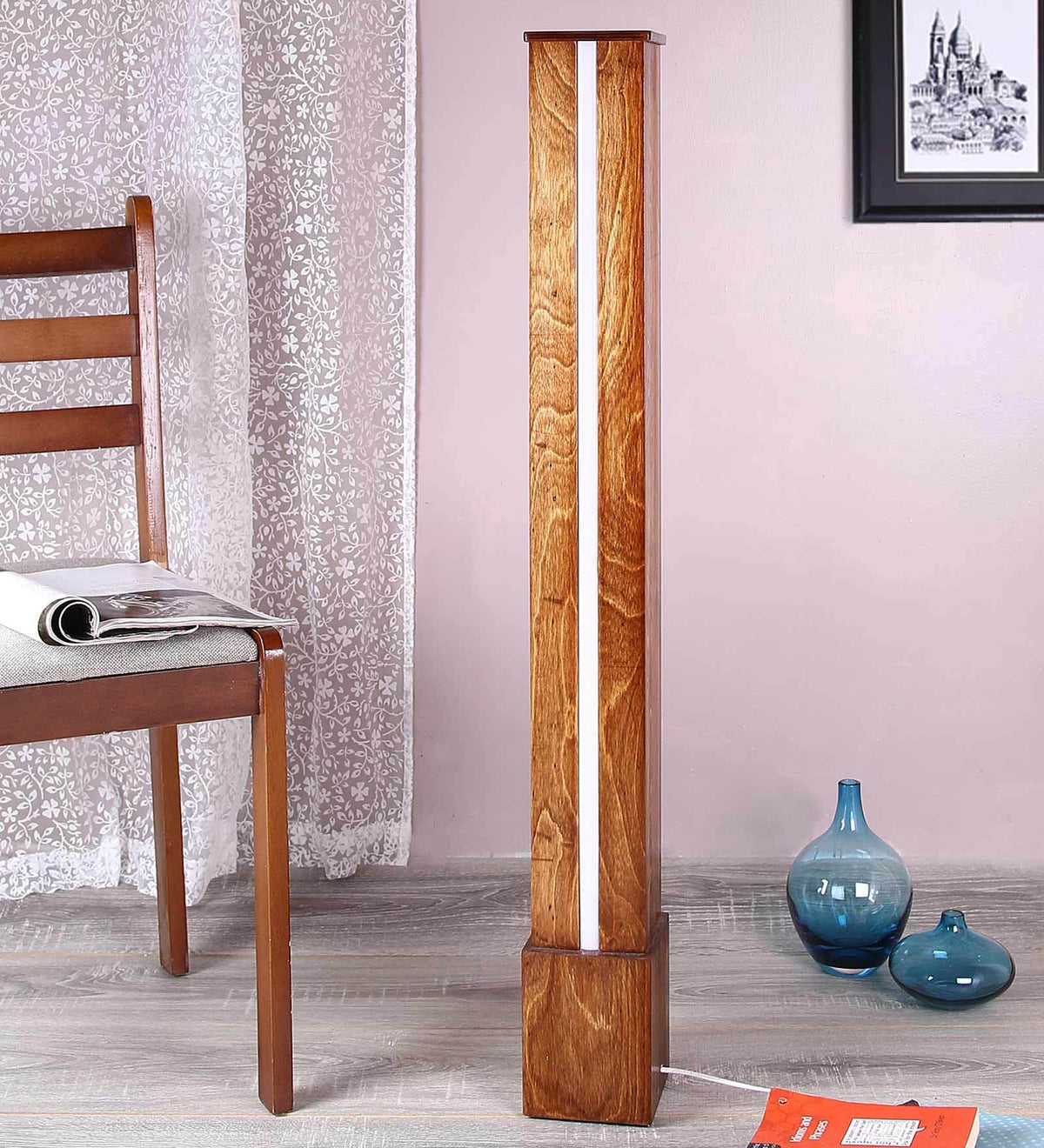 Minimalist timber accent light in a tall rectangular pillar design with an illuminated central vertical channel.