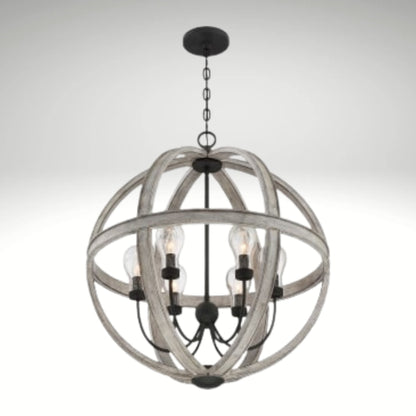 A 5-light orb chandelier featuring weathered gray wood rings and matte black metal hardware.