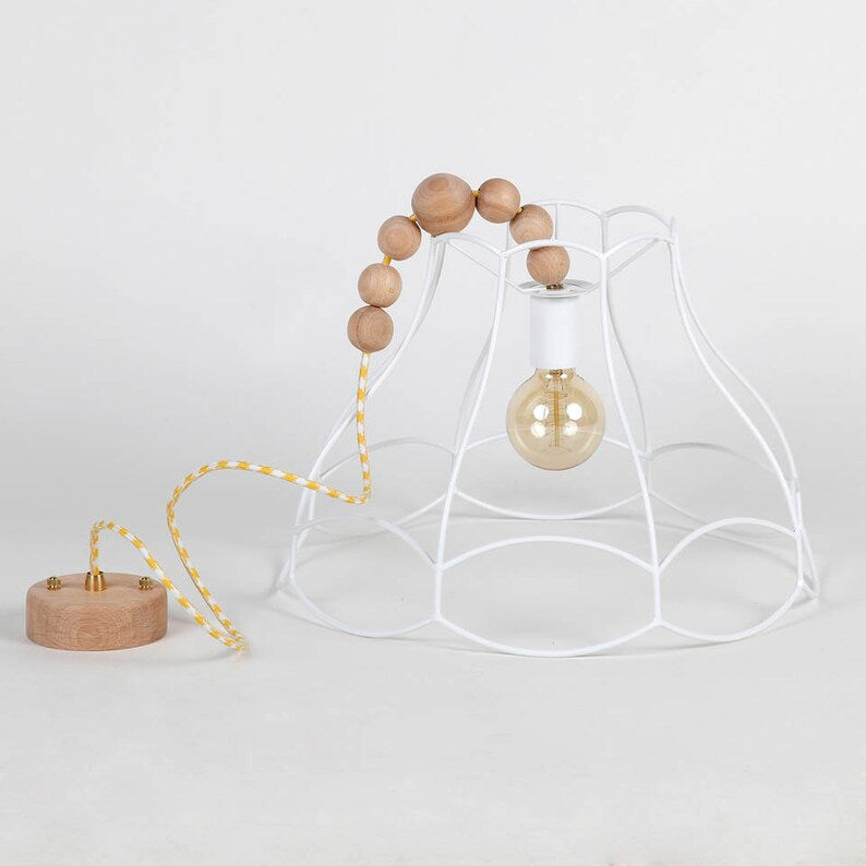 A rustic semi-flush mount ceiling light with a textured dome shade and a glowing bulb.