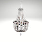 Elegant empire chandelier made with layers of distressed white wood beads and a black metal frame