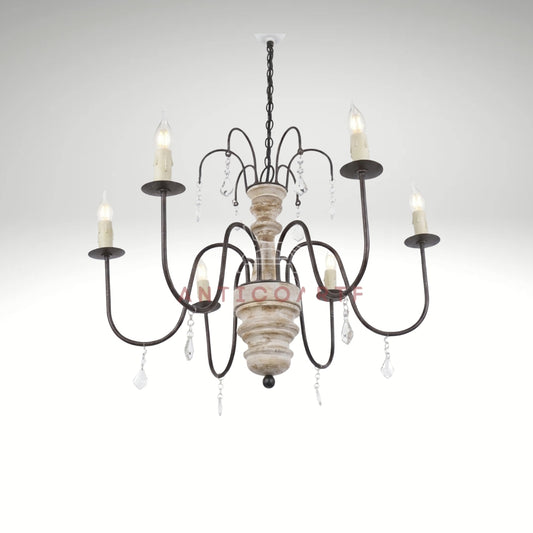 Rustic 6-light candle chandelier with a distressed white wood spindle, curved bronze metal arms, and hanging crystal accents.