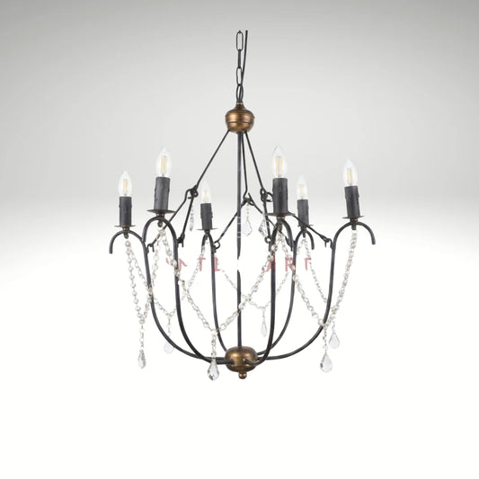 A 6-light candle-style chandelier featuring a black wrought iron cage frame, distressed bronze hardware accents, and delicate hanging crystal bead chains with teardrop pendants.