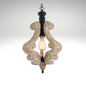 Distressed rustic wood scroll pendant light fixture with a warm vintage Edison bulb.