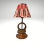 Handmade vintage wooden table lamp with an earthy wicker woven lampshade