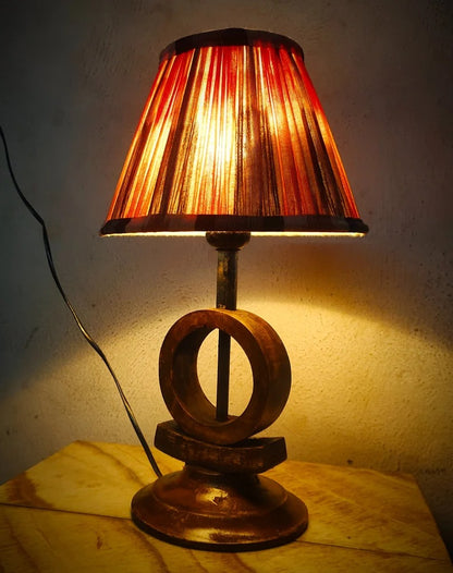 Handmade vintage wooden table lamp with an earthy wicker woven lampshade