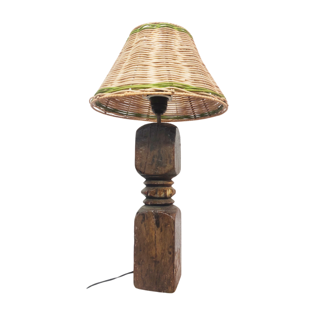 Handmade vintage wooden table lamp with an earthy wicker woven lampshade