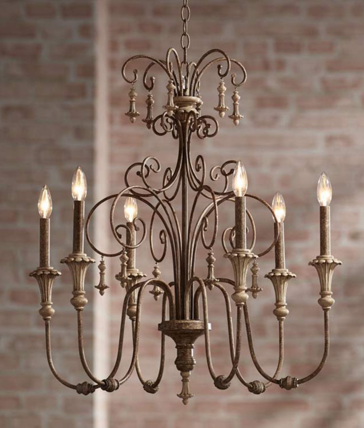 Vintage style iron chandelier featuring candle-style bulbs.