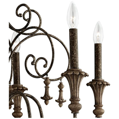 Vintage style iron chandelier featuring candle-style bulbs.
