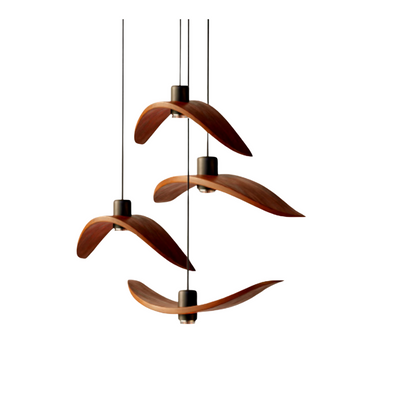 Minimalist Scandinavian ceiling chandelier featuring four bird-wing-shaped natural wood shades dangling at adjustable heights.
