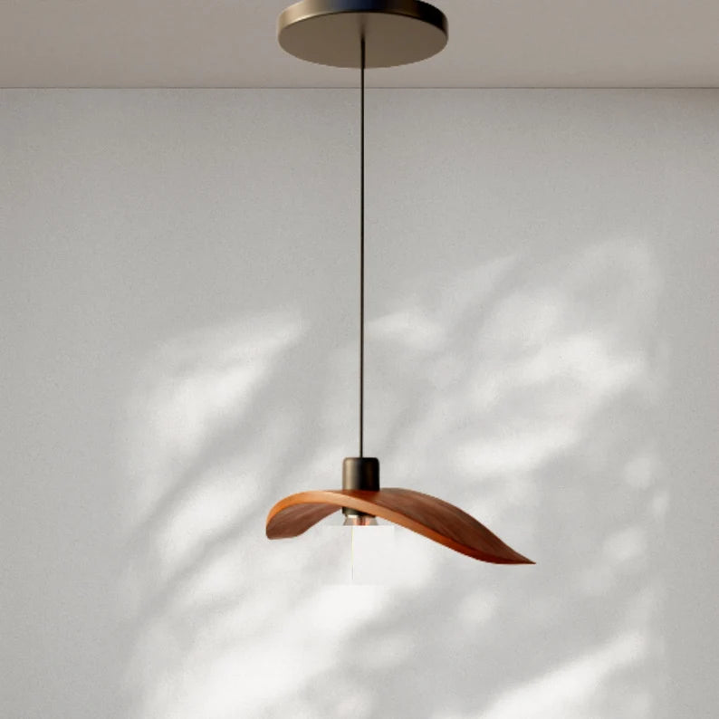Minimalist Scandinavian ceiling chandelier featuring four bird-wing-shaped natural wood shades dangling at adjustable heights.