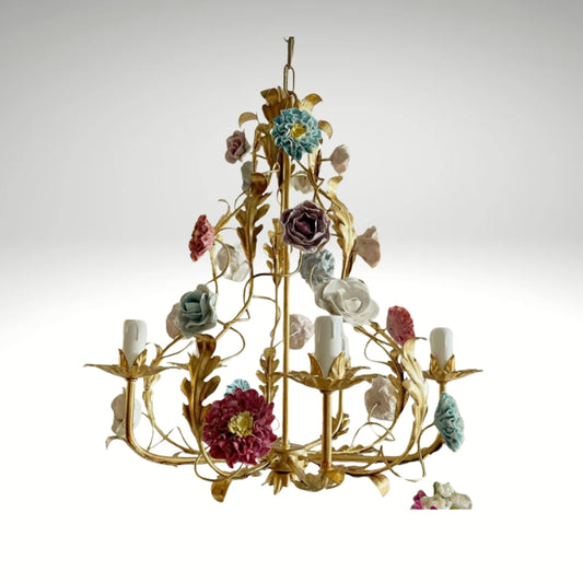 Shabby chic floral chandelier featuring porcelain roses and gold branching arms.