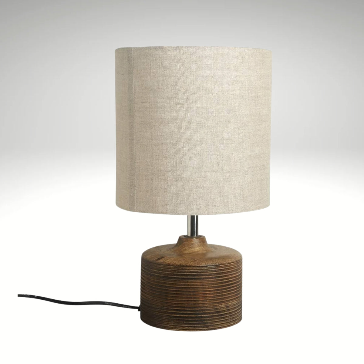 Minimalist rustic wooden bedside table lamp with grooved base detail and textured fabric shade, ideal for living room and bedroom decor.