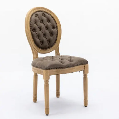 Classic French country dining chair featuring brown tufted cushions and distressed wooden legs.