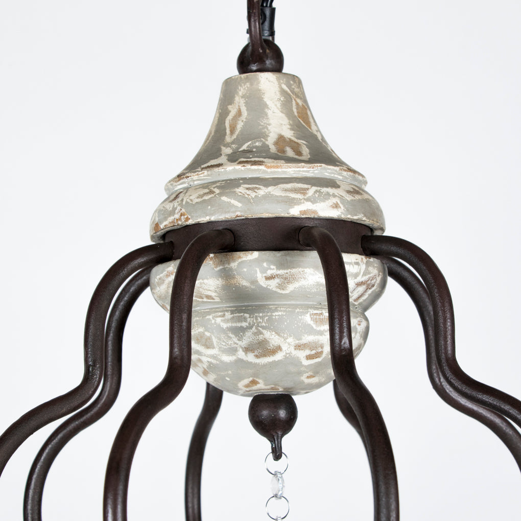 Vintage 8-light wrought iron and distressed white wood chandelier with decorative crystal drops